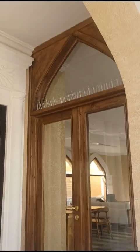 أبواب ونوافذ خشبية مقوسة